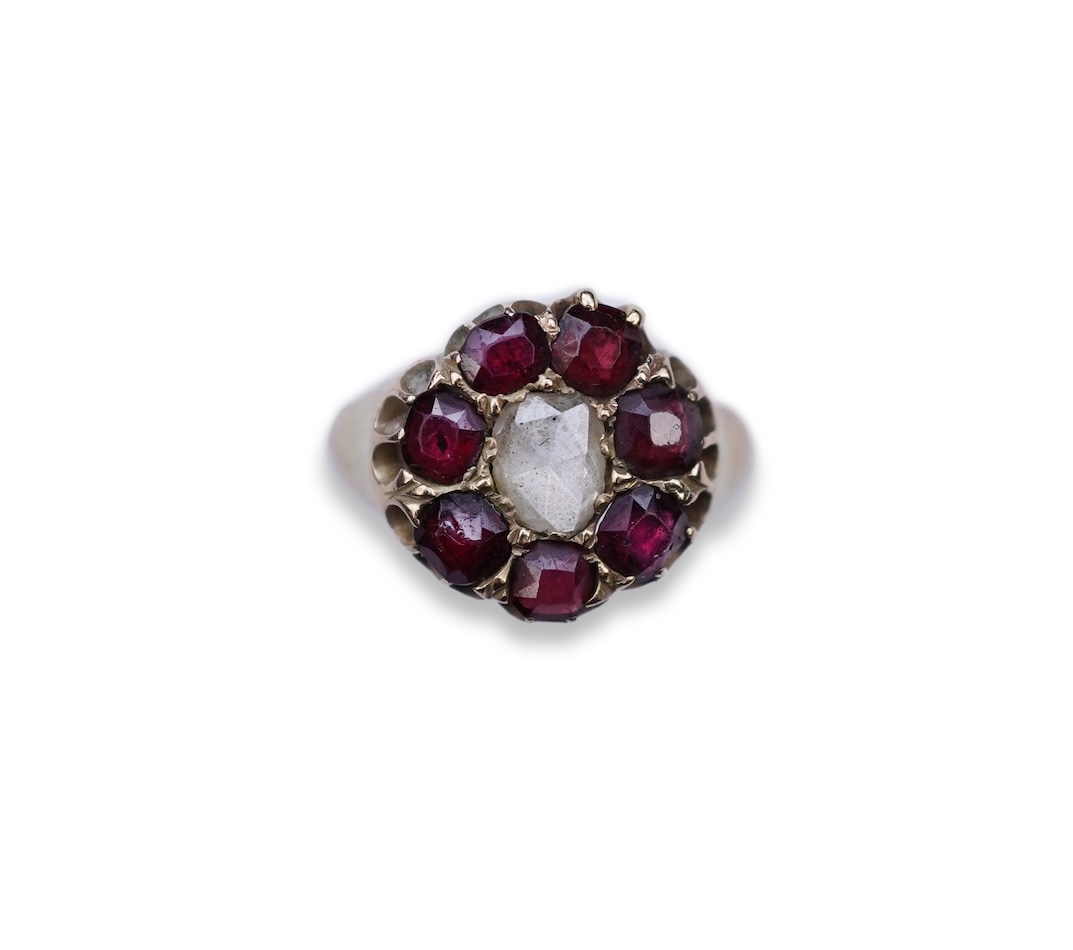 A garnet and diamond ring, late 19th century